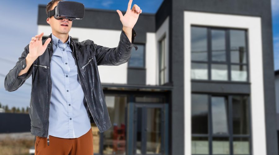 cheerful-man-virtual-glasses-front-new-house